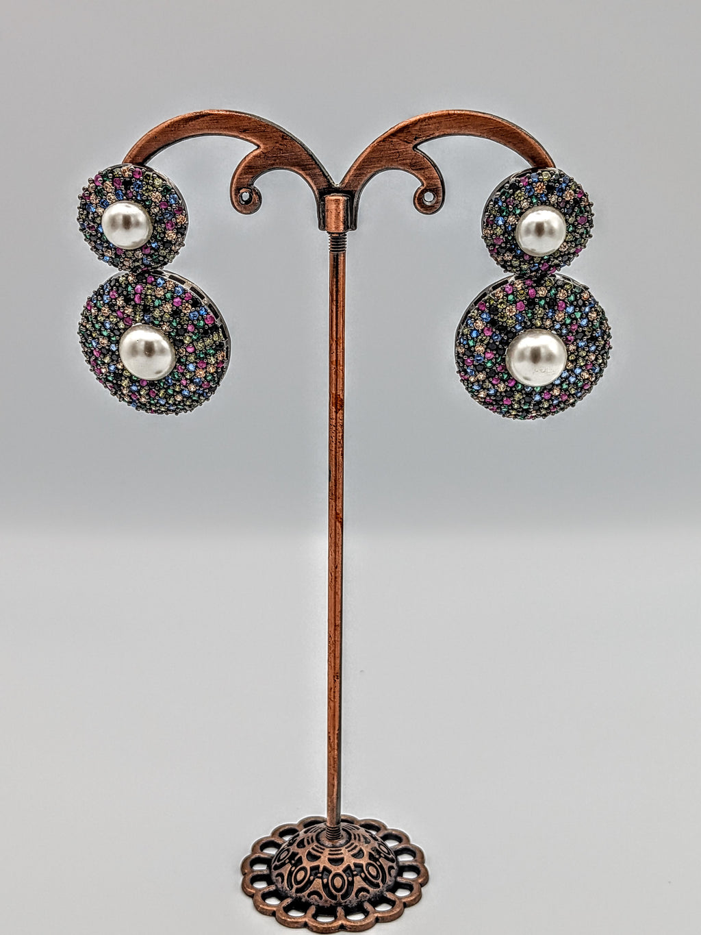 Multicolour double-disc earrings with micro stones and central pearls  — vibrant festive statement earrings.