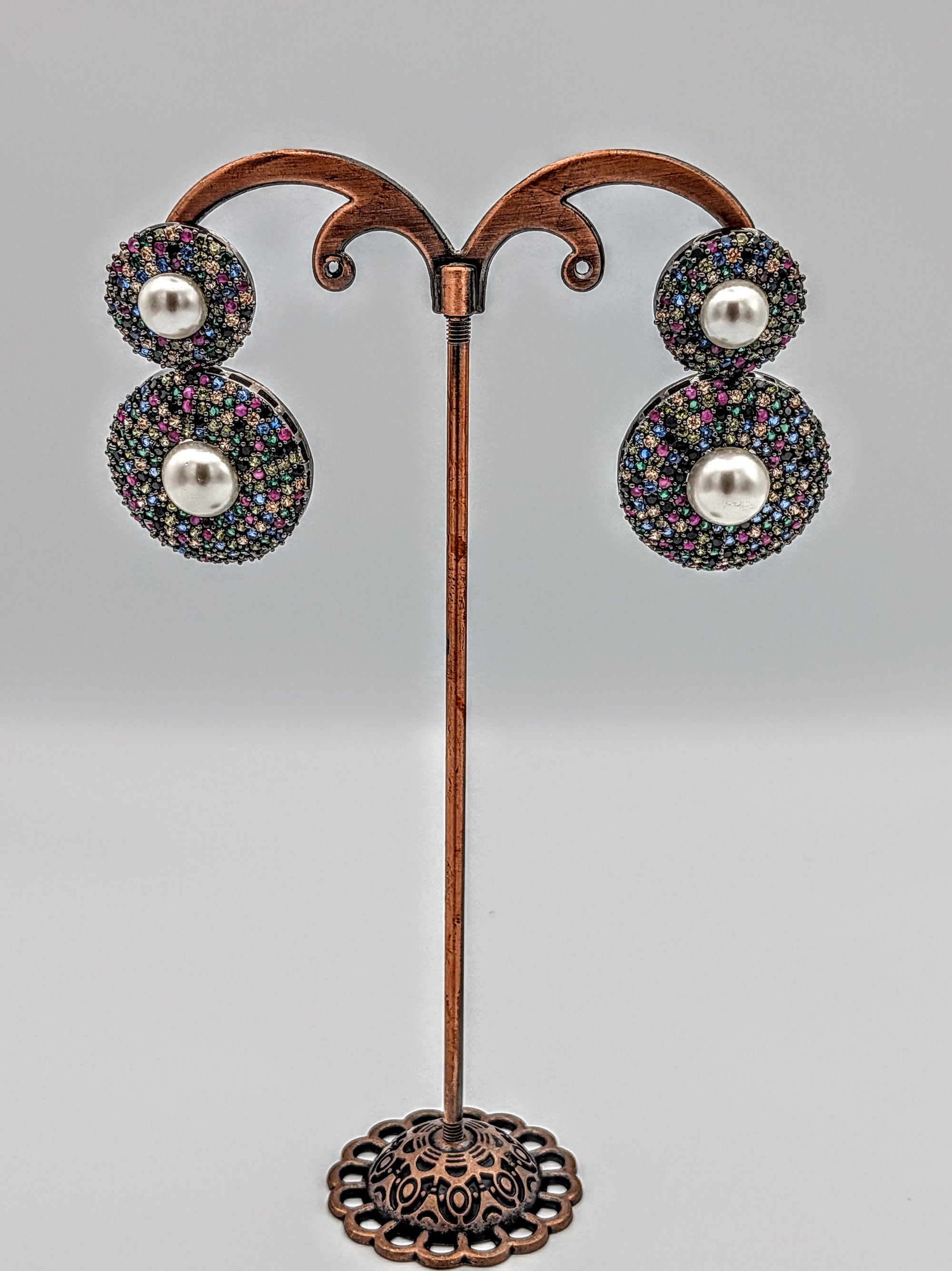 Multicolour double-disc earrings with micro stones and central pearls  — vibrant festive statement earrings.