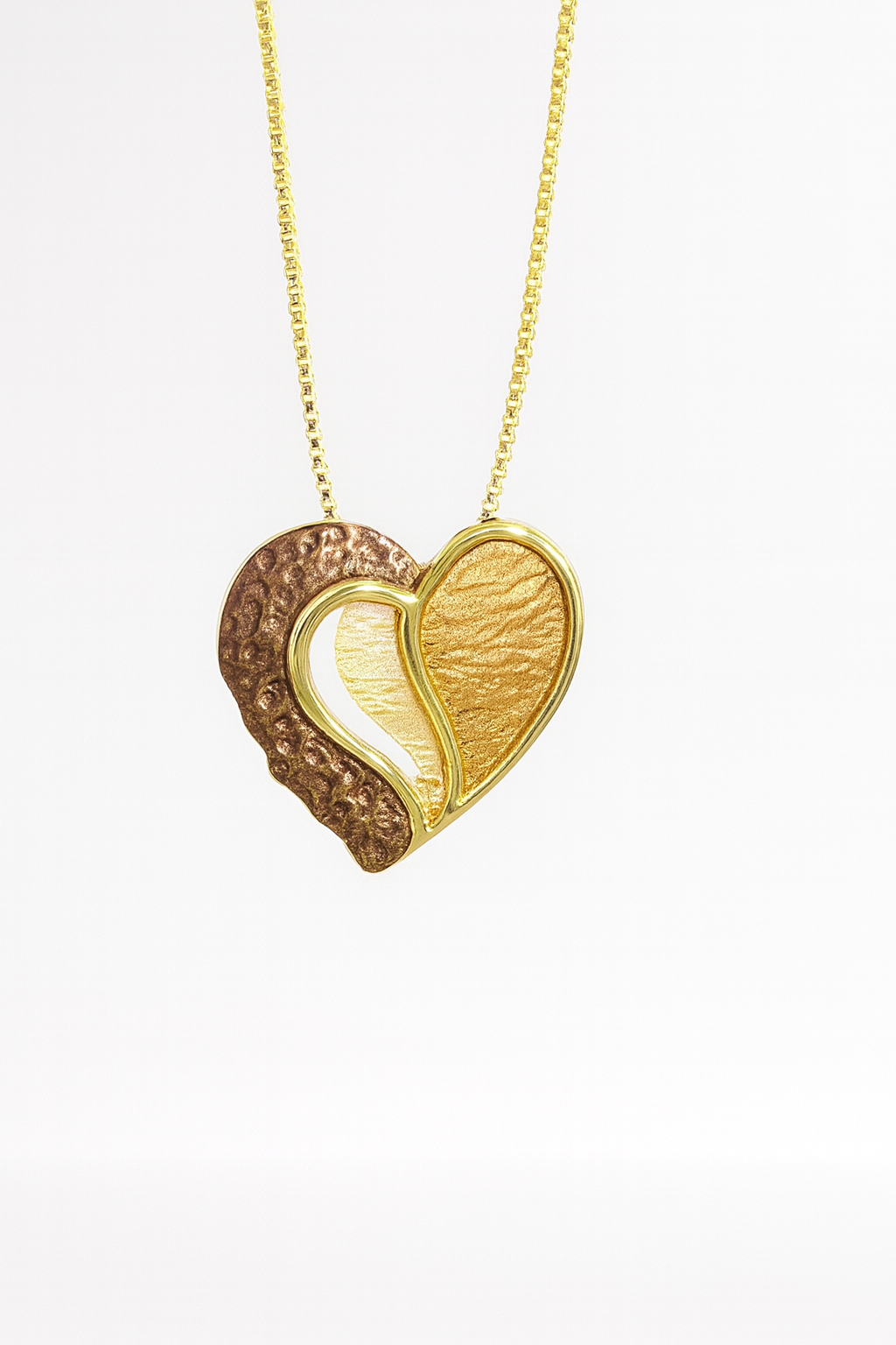 Heart-shaped gold and brown pendant