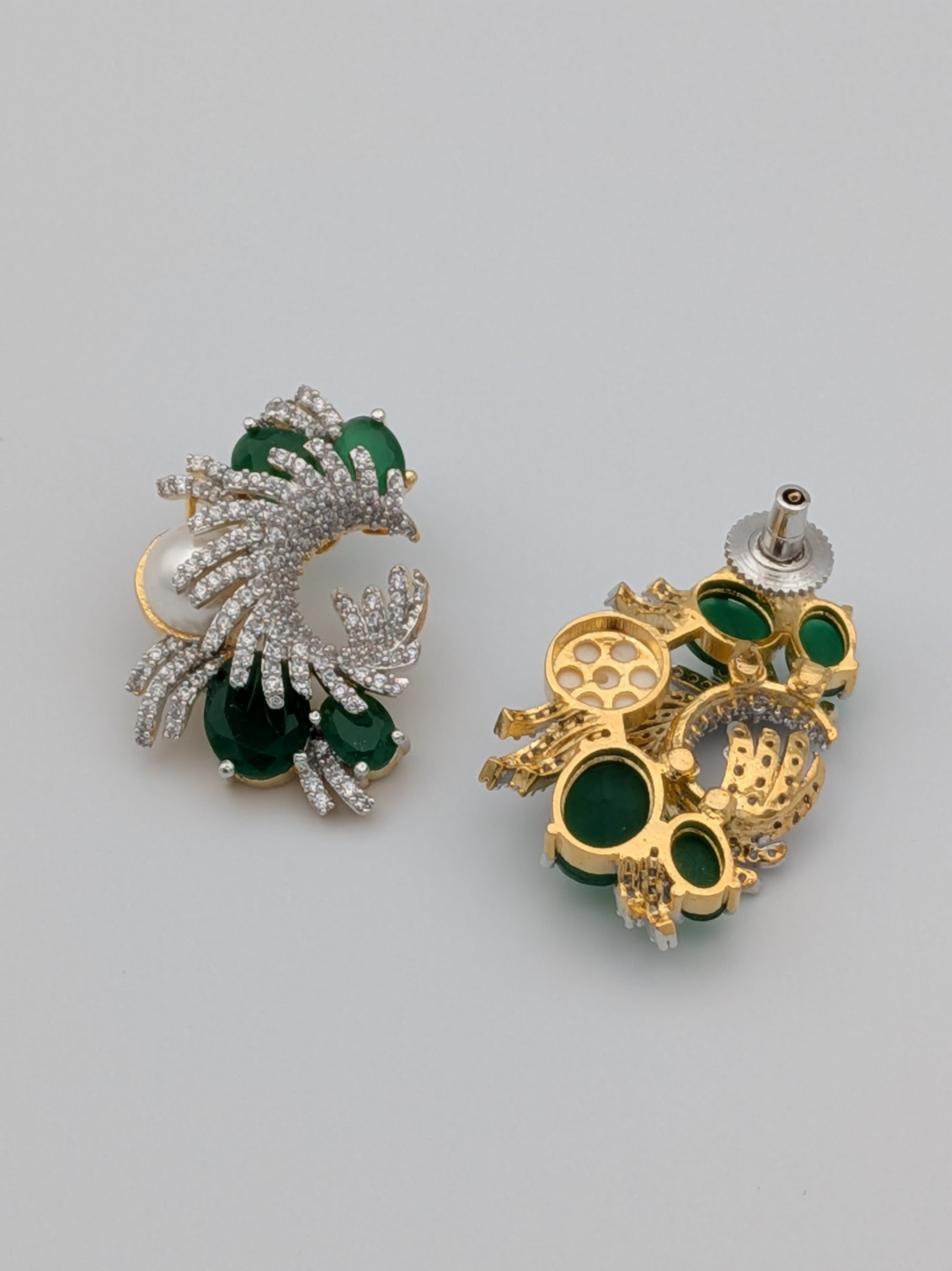 Emerald green and zircon swirl earrings with pearl accent  — premium statement earrings by TreasureDrum.