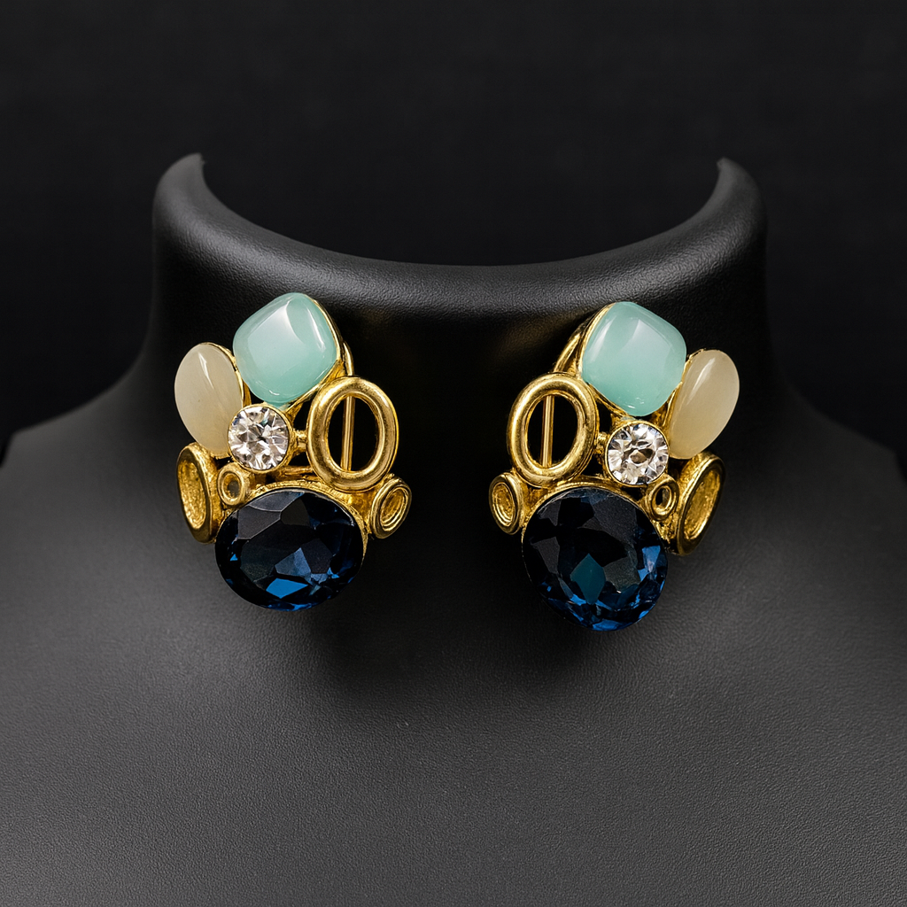 Pair of gold earrings with blue and green gemstones 