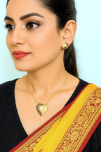 Bronzed Embrace Heart Pendant Set – textured bronze and gold heart pendant with matching earrings