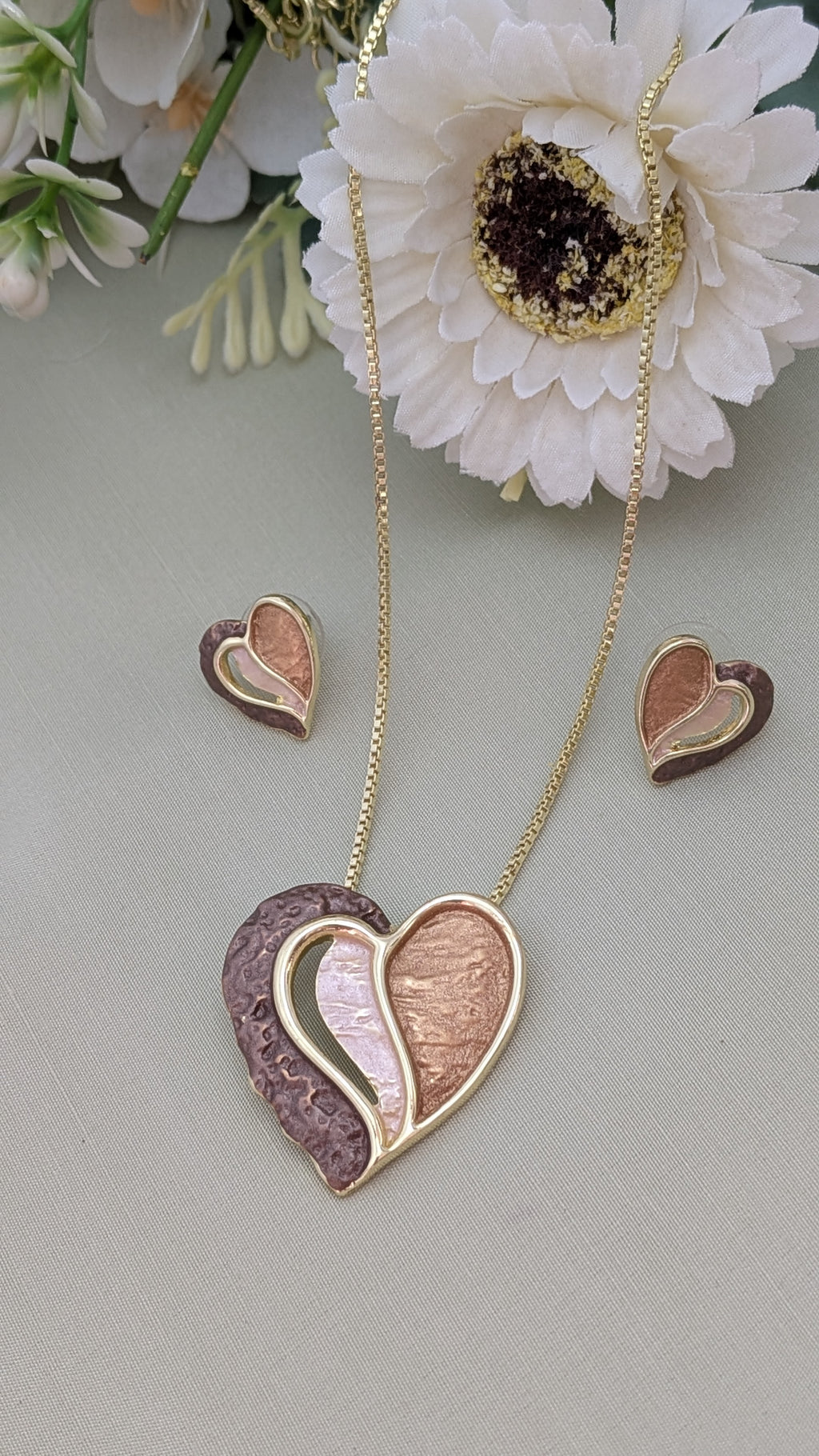 Bronzed Embrace Heart Pendant Set – textured bronze and gold heart pendant with matching earrings