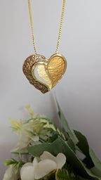 Bronzed Embrace Heart Pendant Set – textured bronze and gold heart pendant with matching earrings
