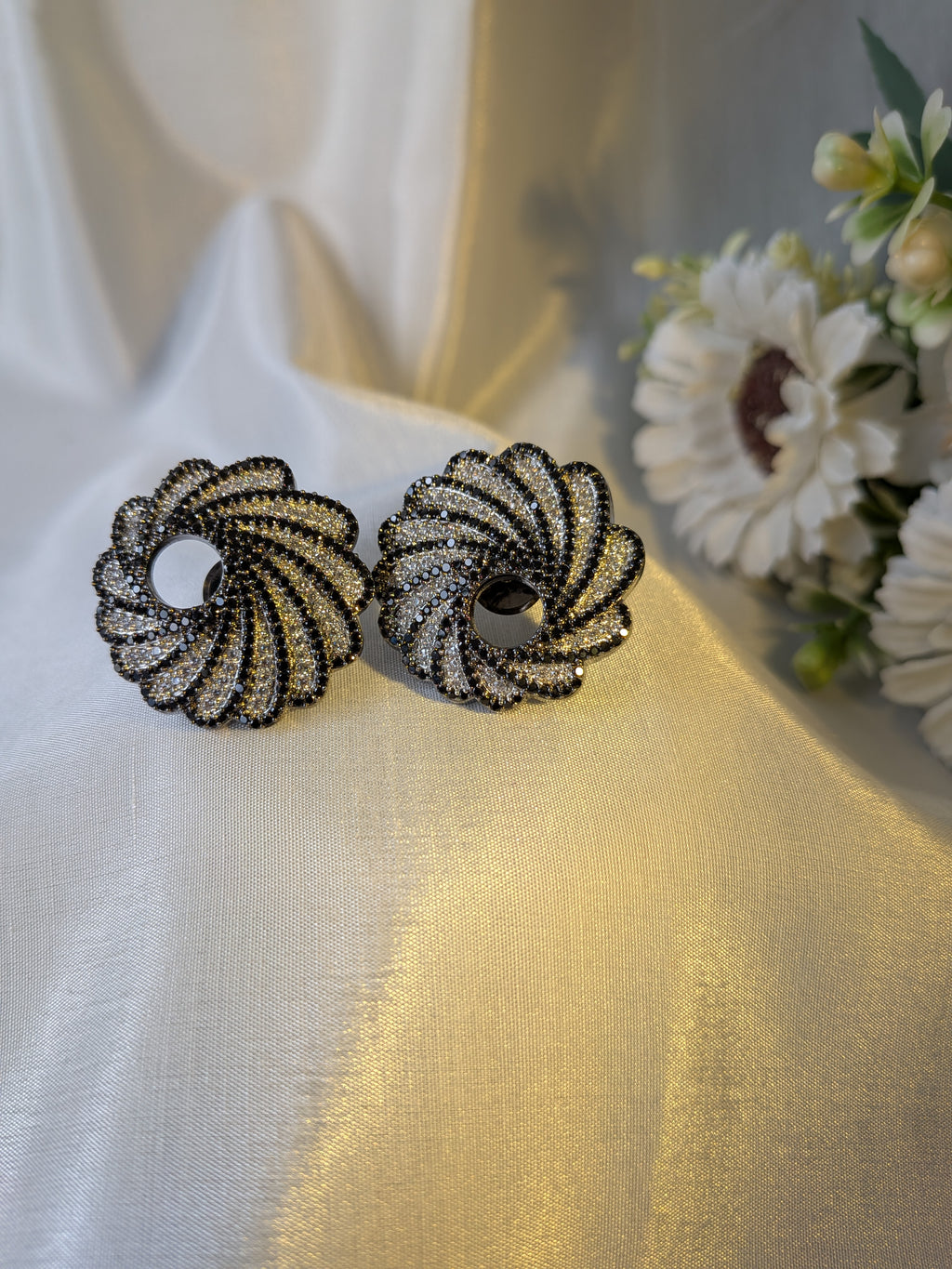 Twilight Swirl Studs – spiral gunmetal studs with black and white zirconia