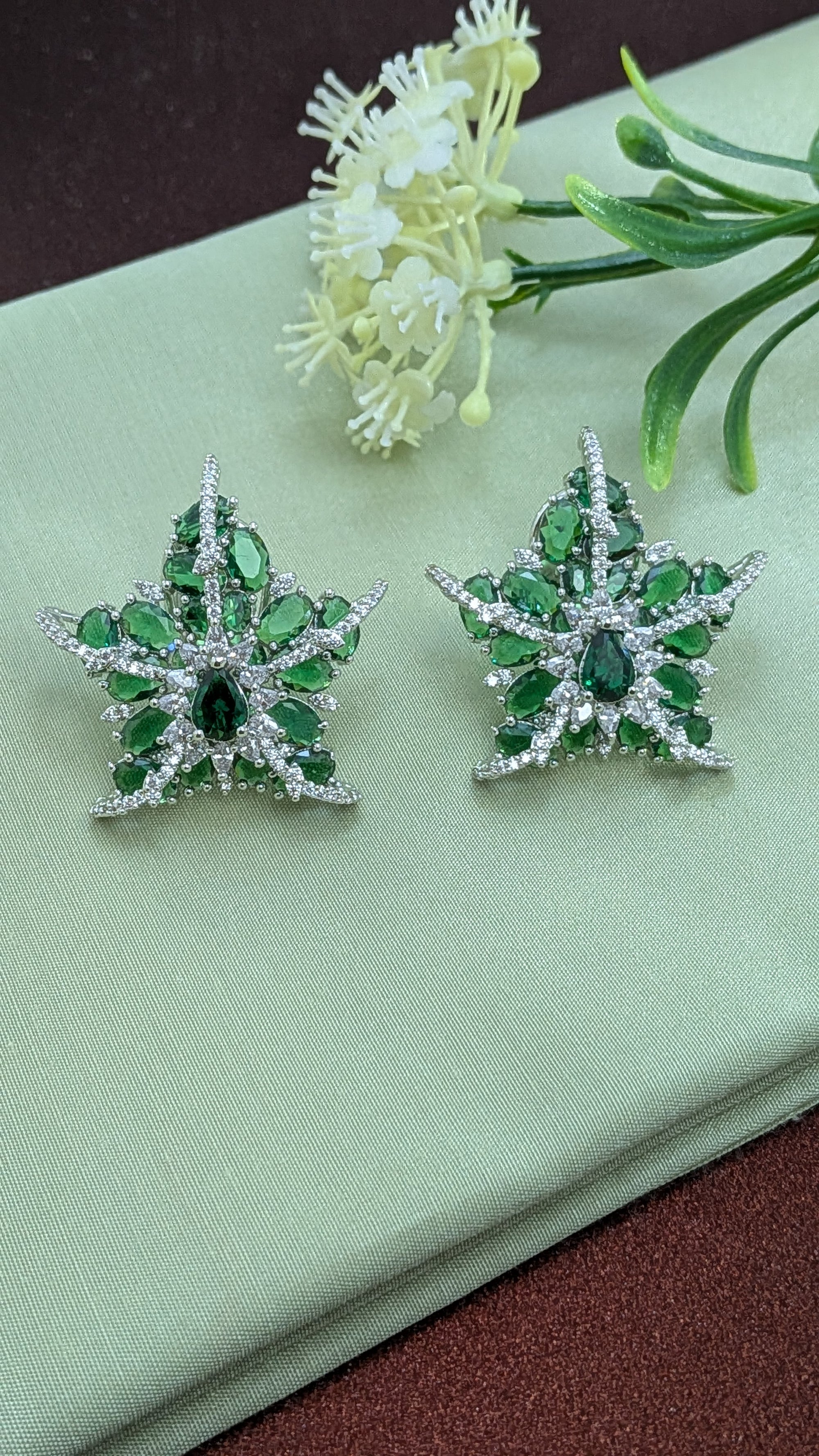 Emerald Nova Studs – green stone starburst stud with pavé zirconia