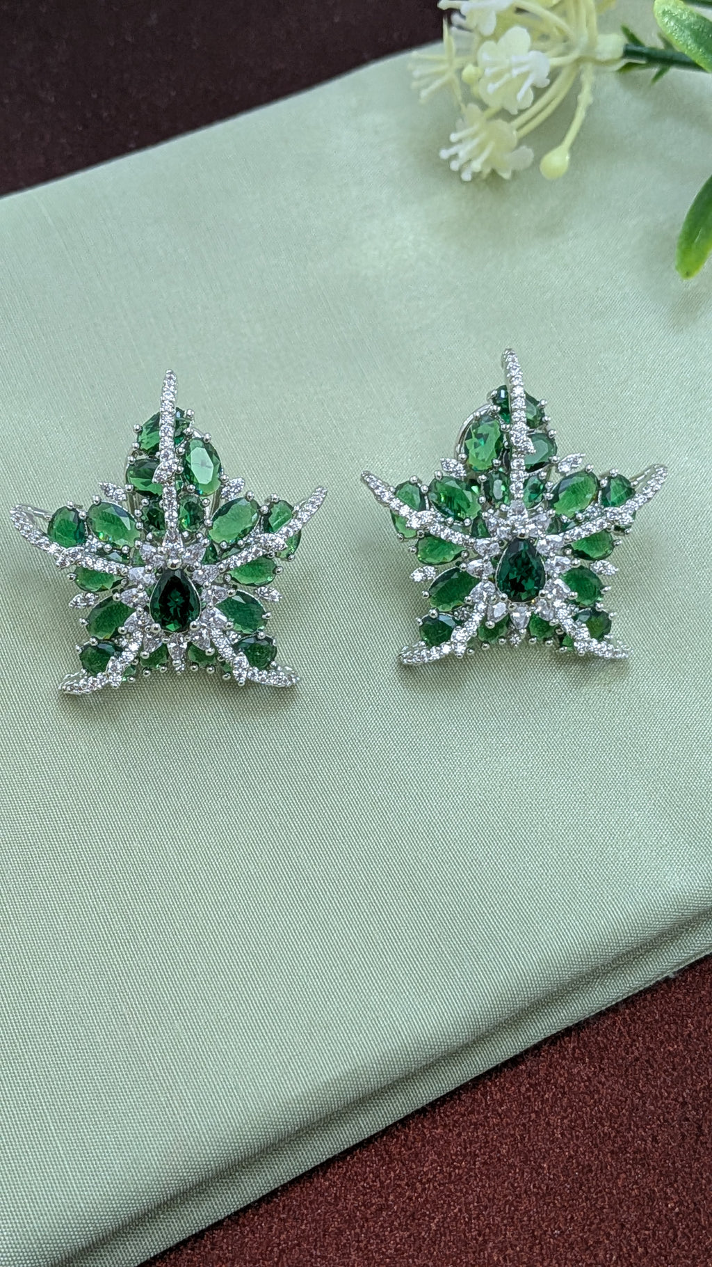 Emerald Nova Studs – green stone starburst stud with pavé zirconia