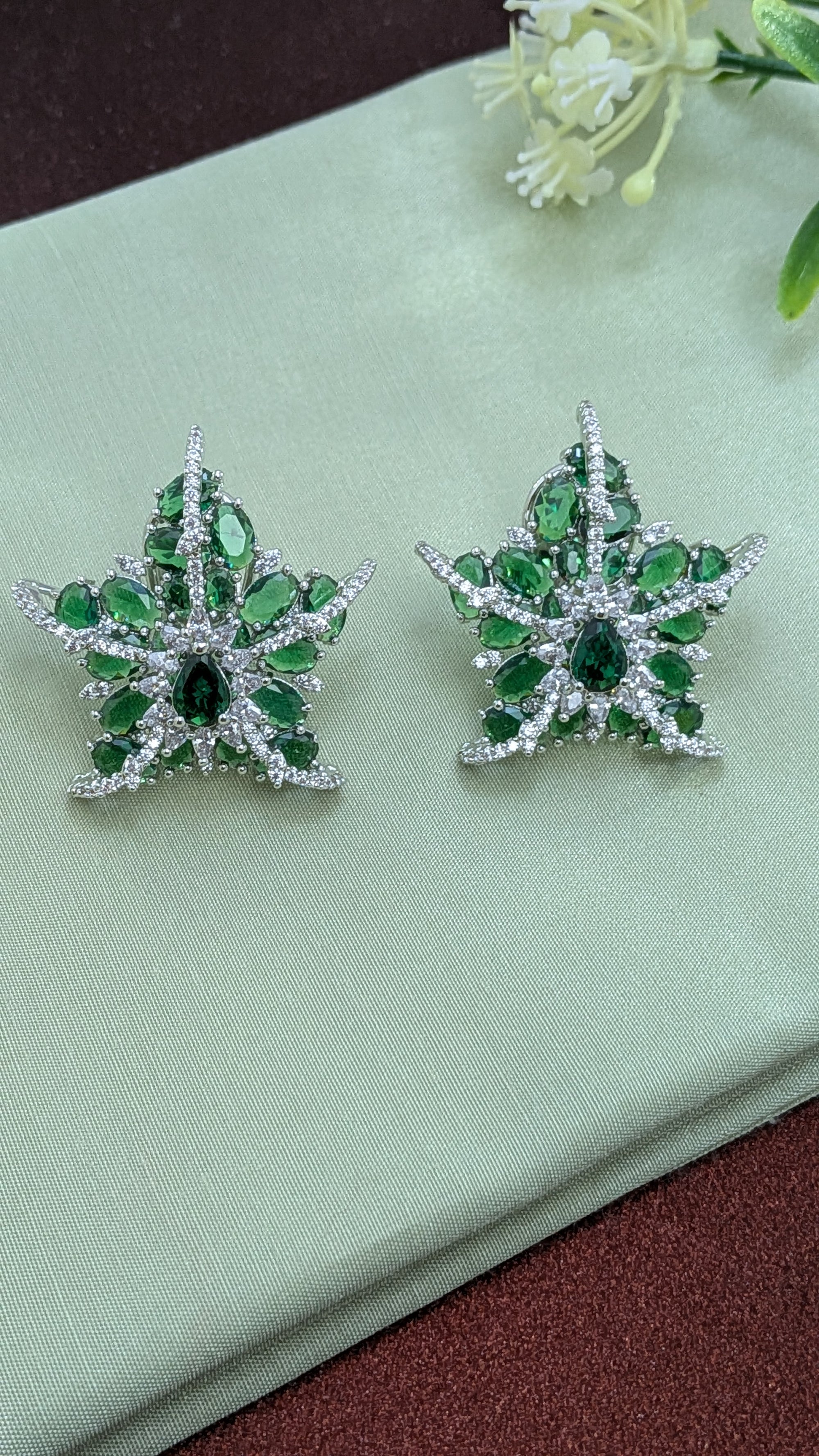 Emerald Nova Studs – green stone starburst stud with pavé zirconia