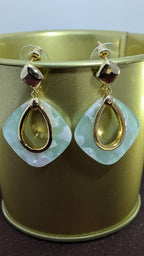 MistDrop Resin Hoops – marbled resin hoops with gold teardrop center