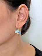 BlueBloom Tassel Drops – enamel petals, crystal accents, and gold tassels