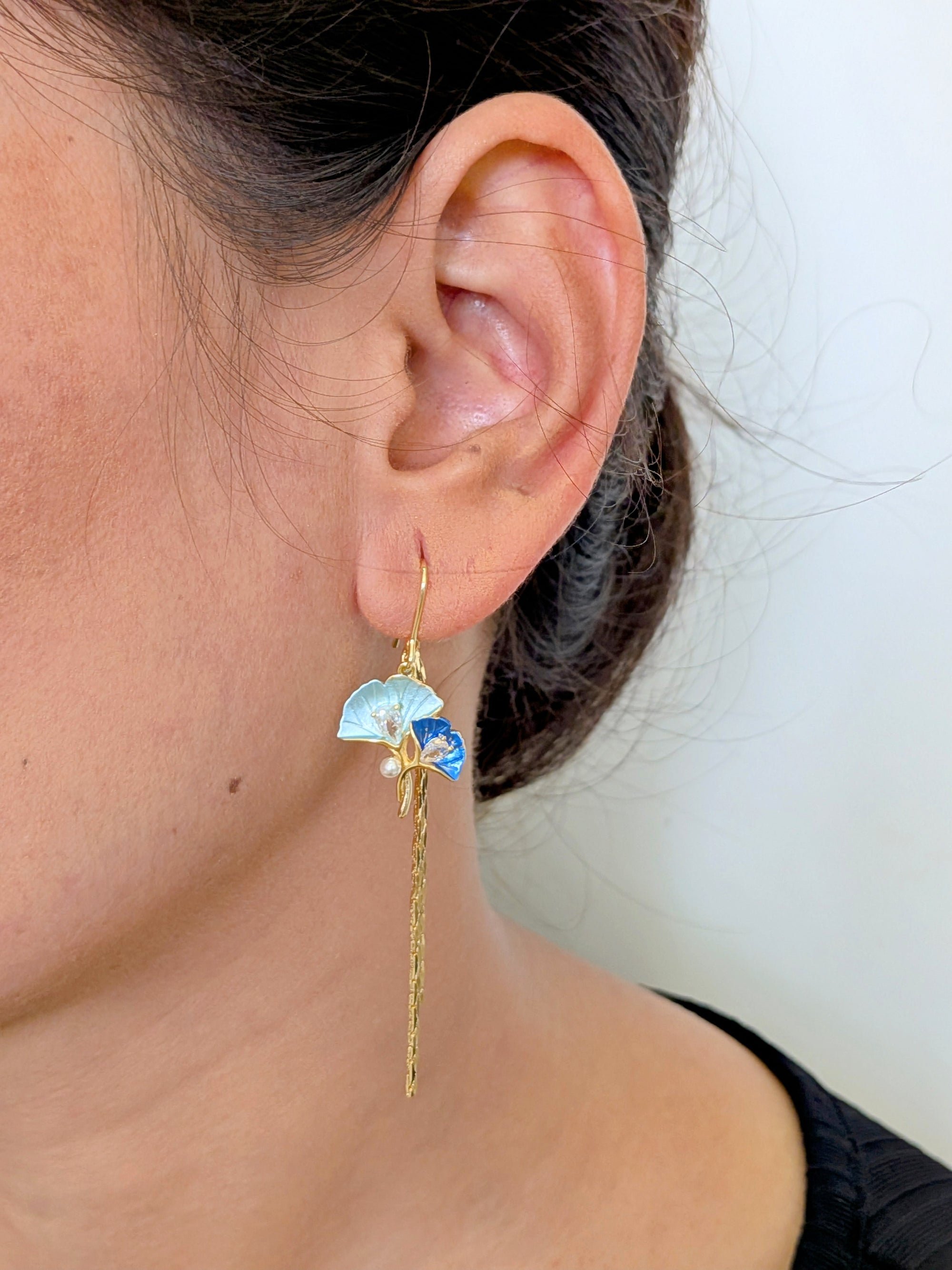 BlueBloom Tassel Drops – enamel petals, crystal accents, and gold tassels