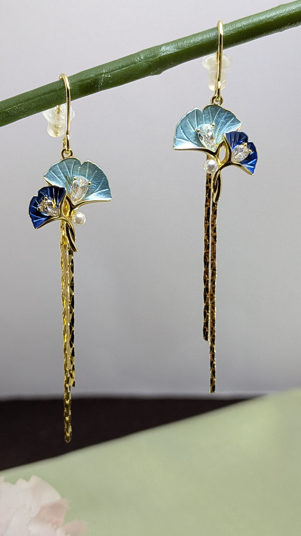 BlueBloom Tassel Drops – enamel petals, crystal accents, and gold tassels