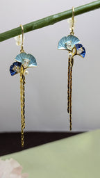 BlueBloom Tassel Drops – enamel petals, crystal accents, and gold tassels