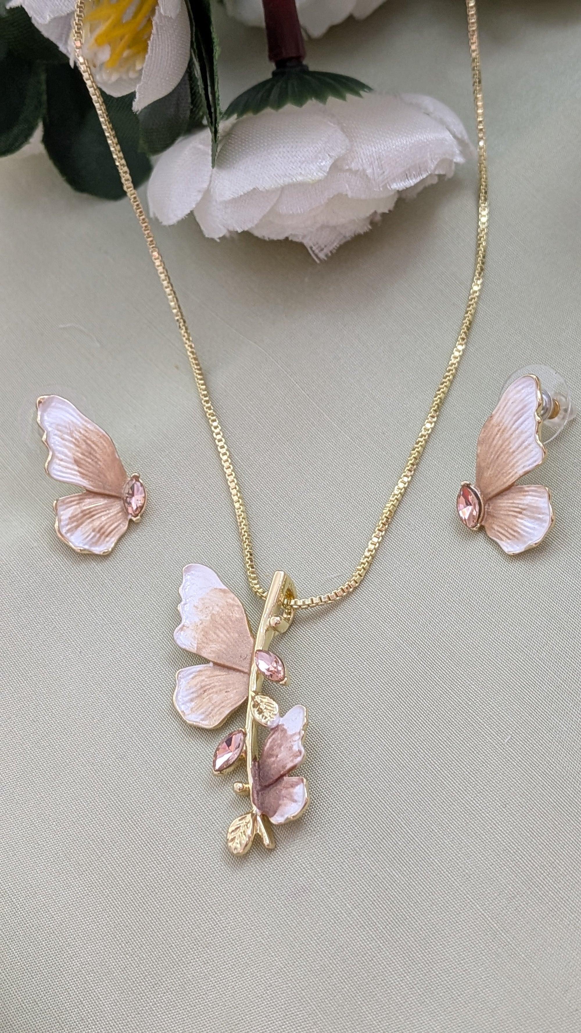 Whispers of Wings Pendant Set – butterfly wing pendant in gold and blush with crystals