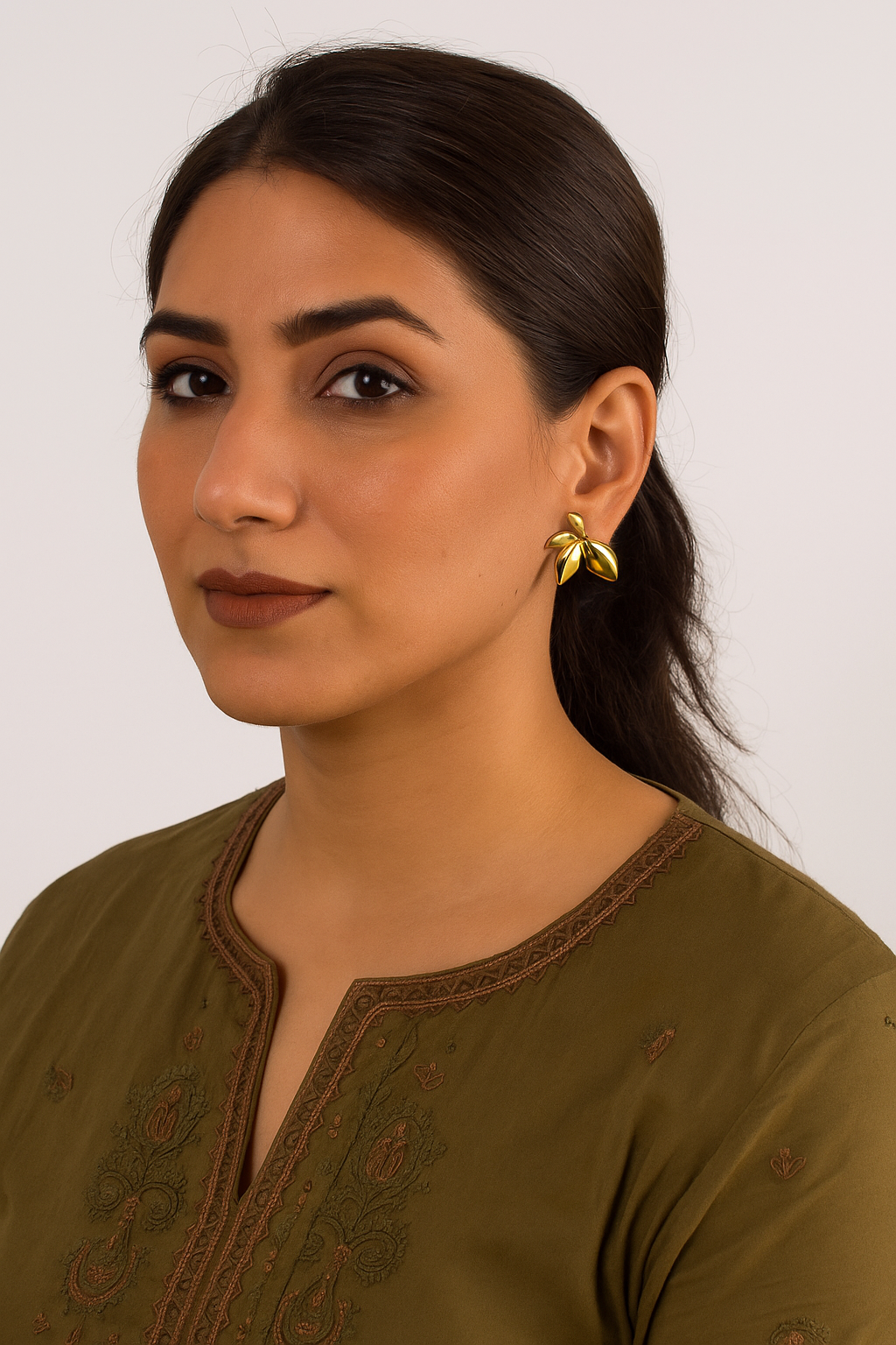 Golden Petal Drop Studs – gold petal-shaped stud earrings
