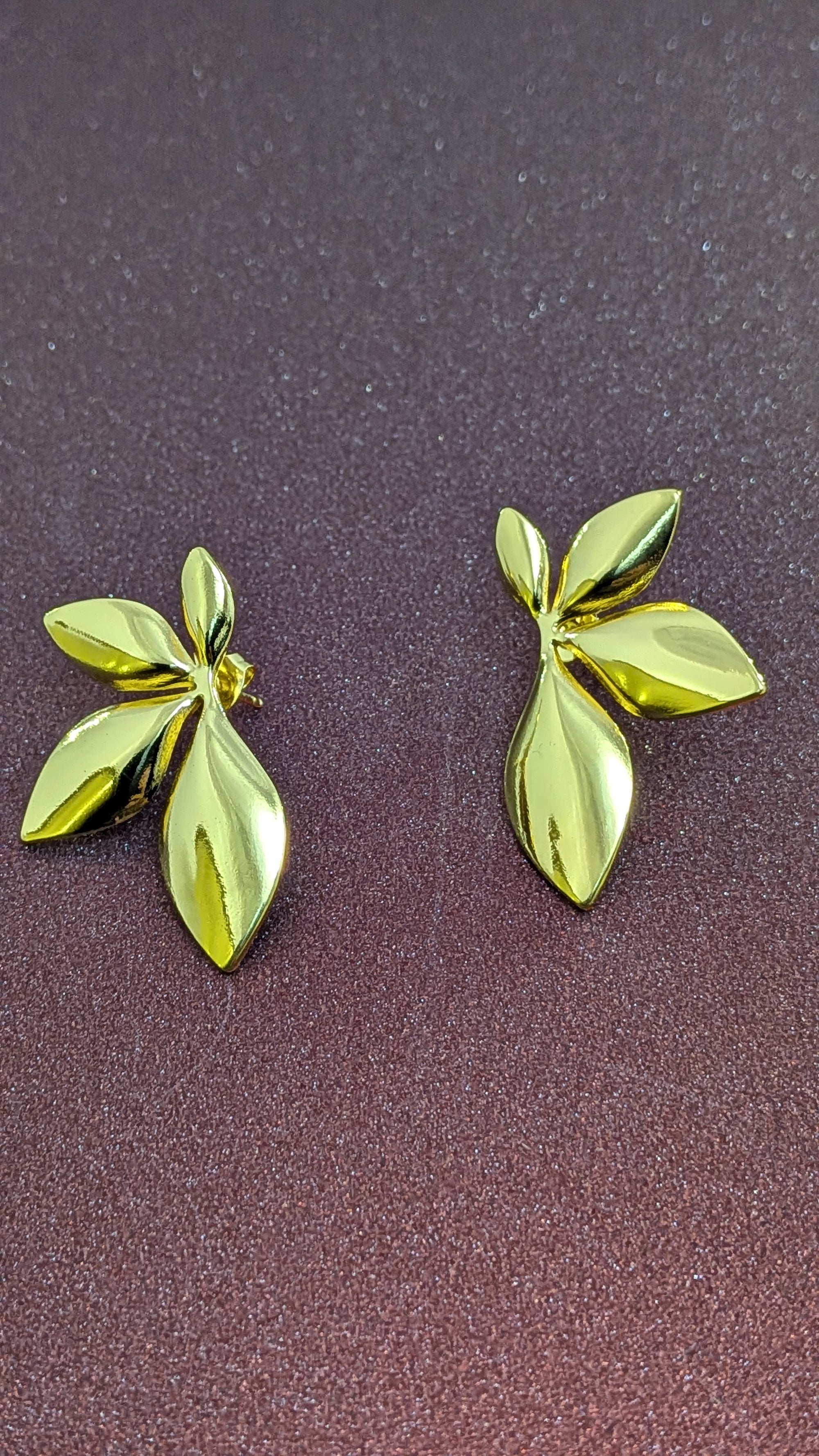 Golden Petal Drop Studs – gold petal-shaped stud earrings