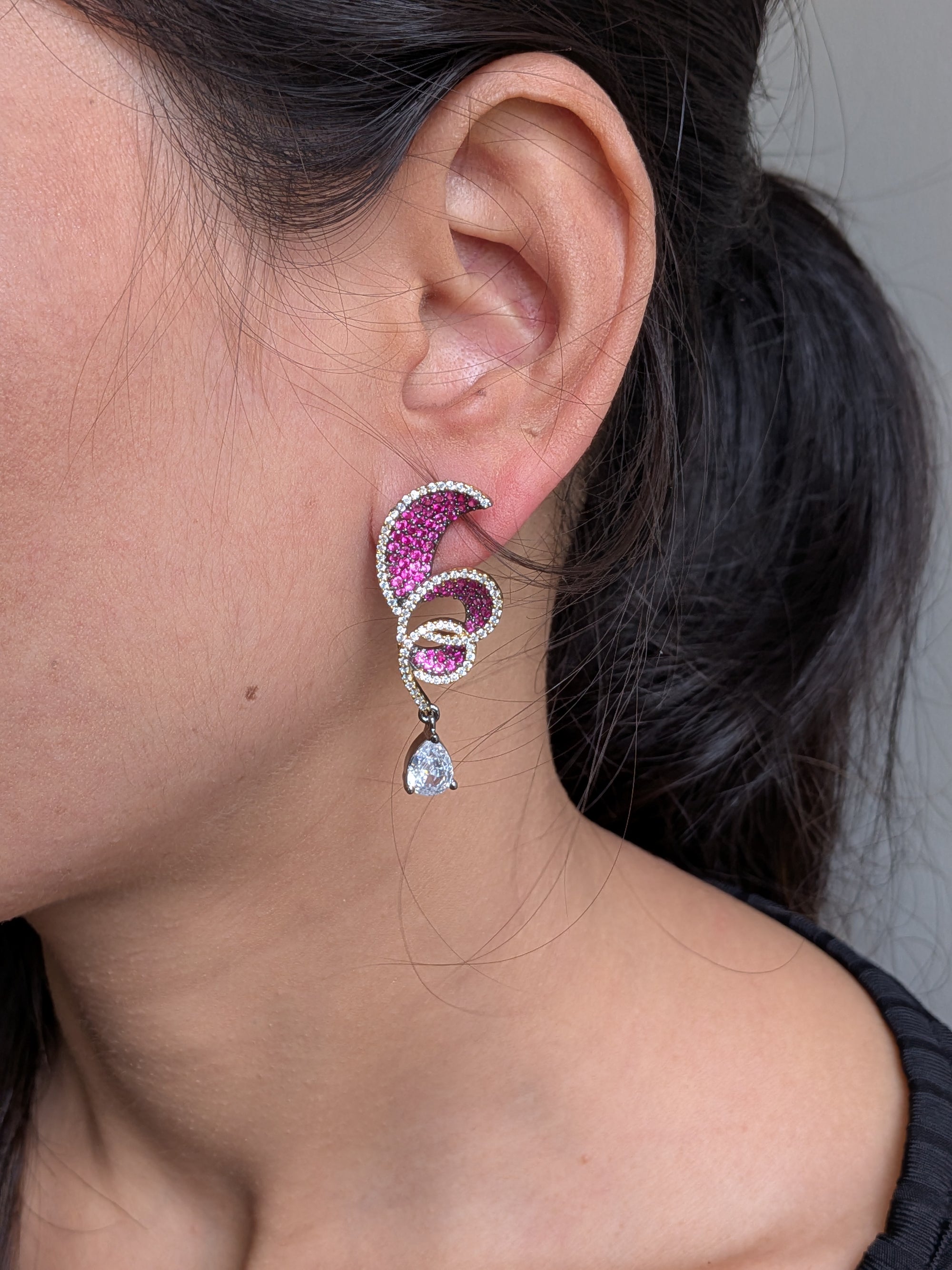 Rust Flame Swirl Drops – fiery swirl earrings with orange pavé and teardrop crystal