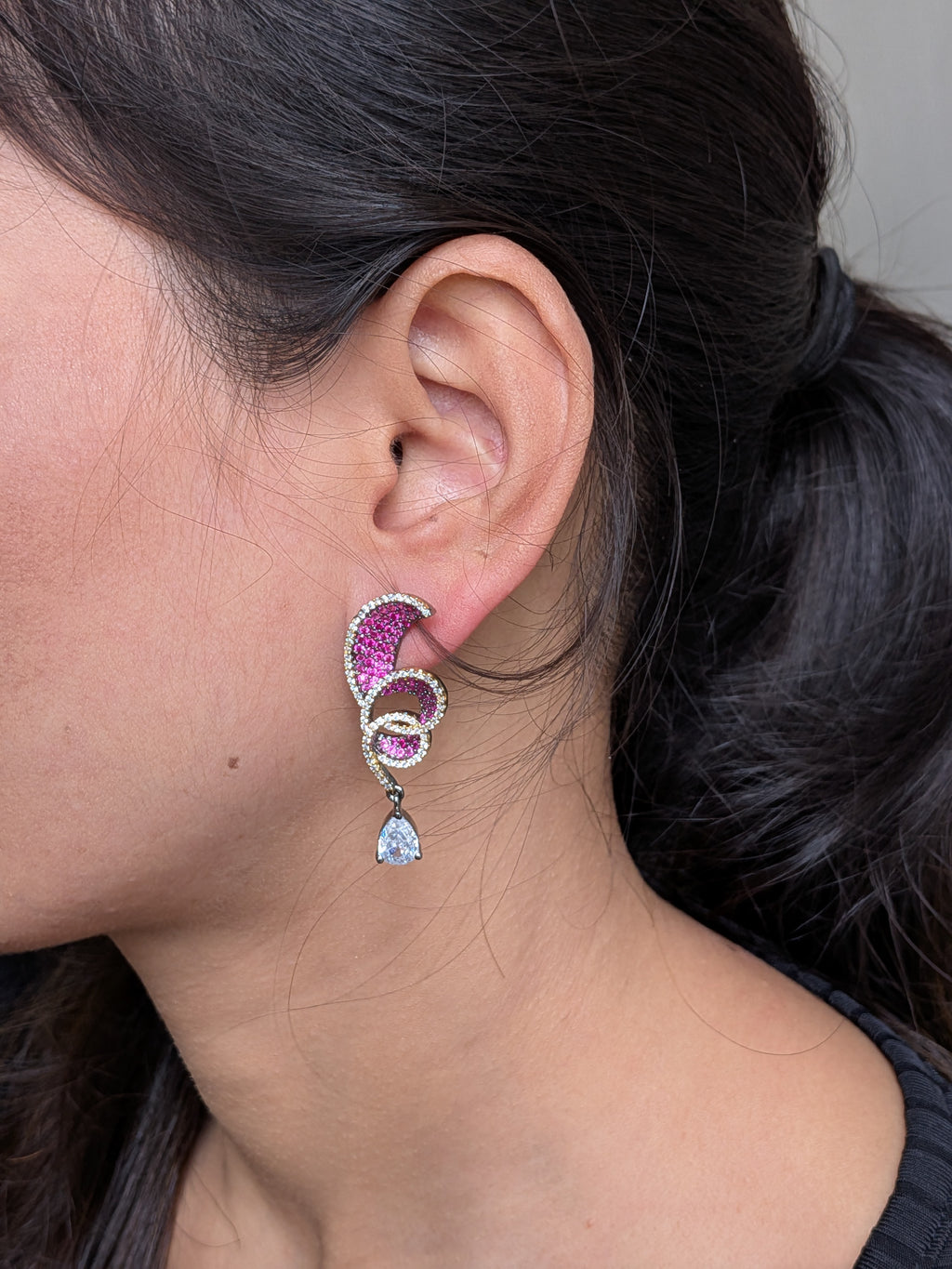 Rust Flame Swirl Drops – fiery swirl earrings with orange pavé and teardrop crystal