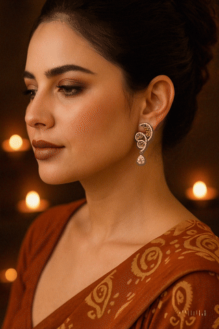 Rust Flame Swirl Drops – fiery swirl earrings with orange pavé and teardrop crystal