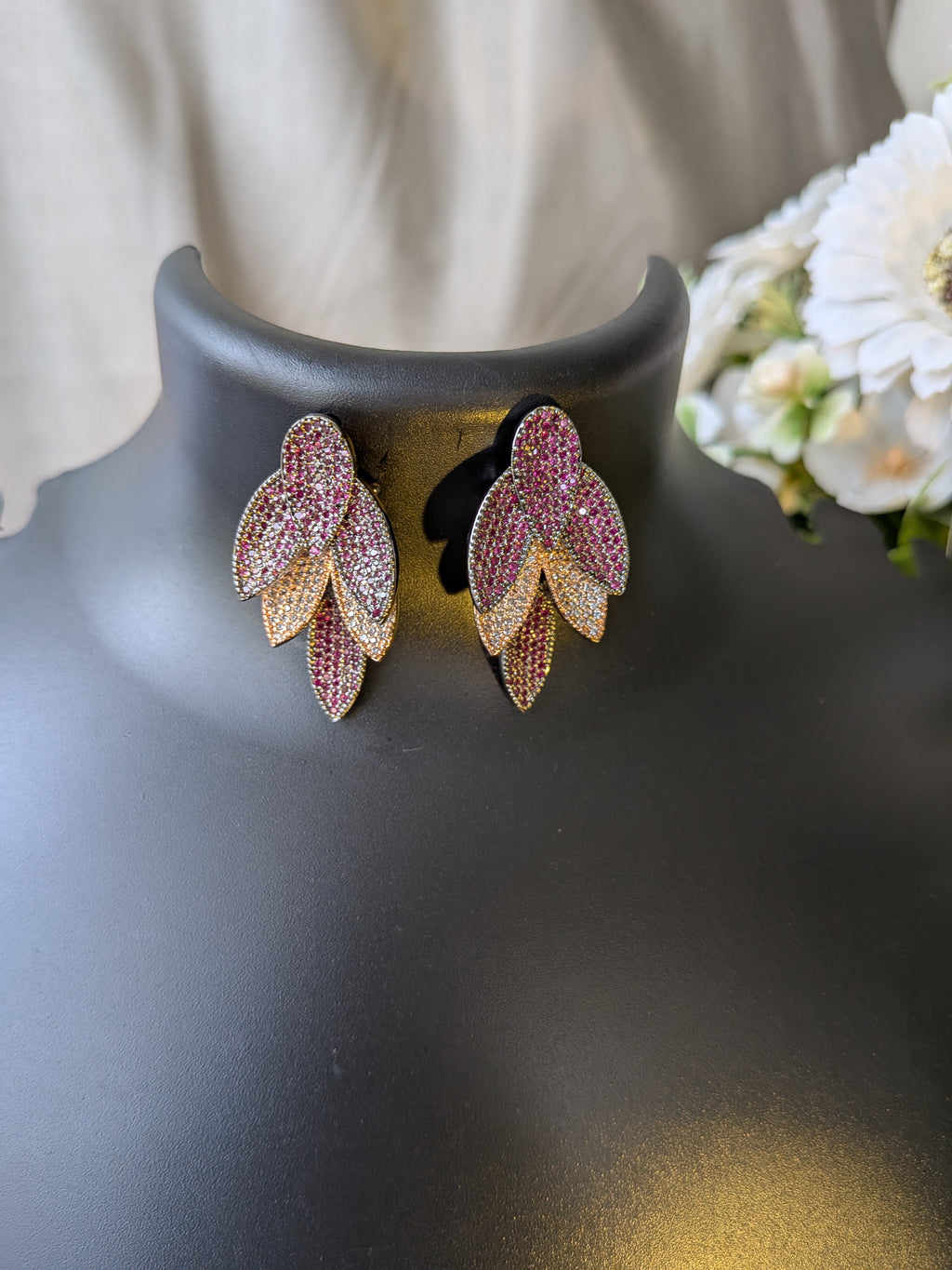 Rosélure Pavé Leaf Earrings – cascading leaf earrings with pink and ruby pavé