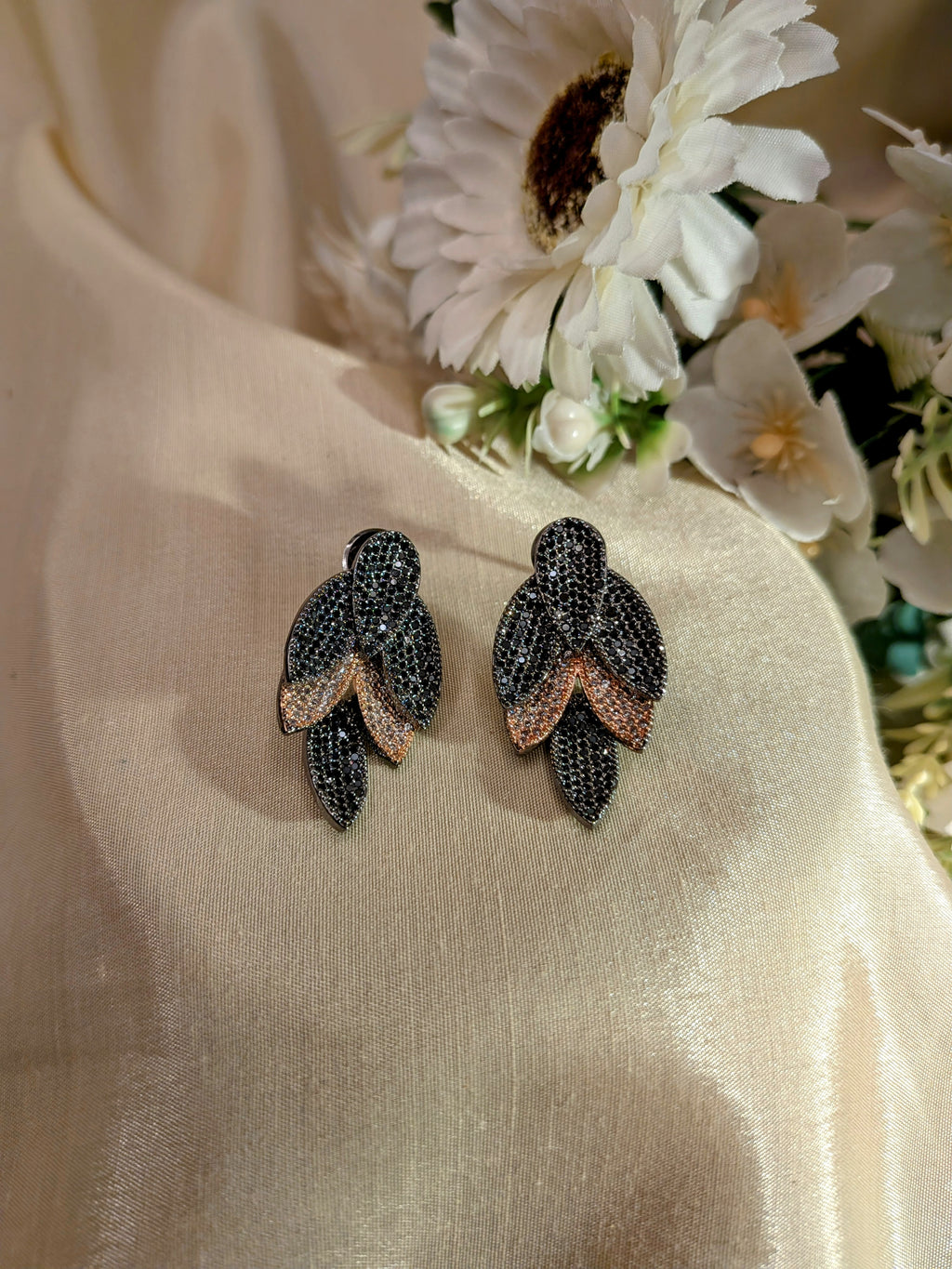 Rosélure Pavé Leaf Earrings – cascading leaf earrings with pink and ruby pavé