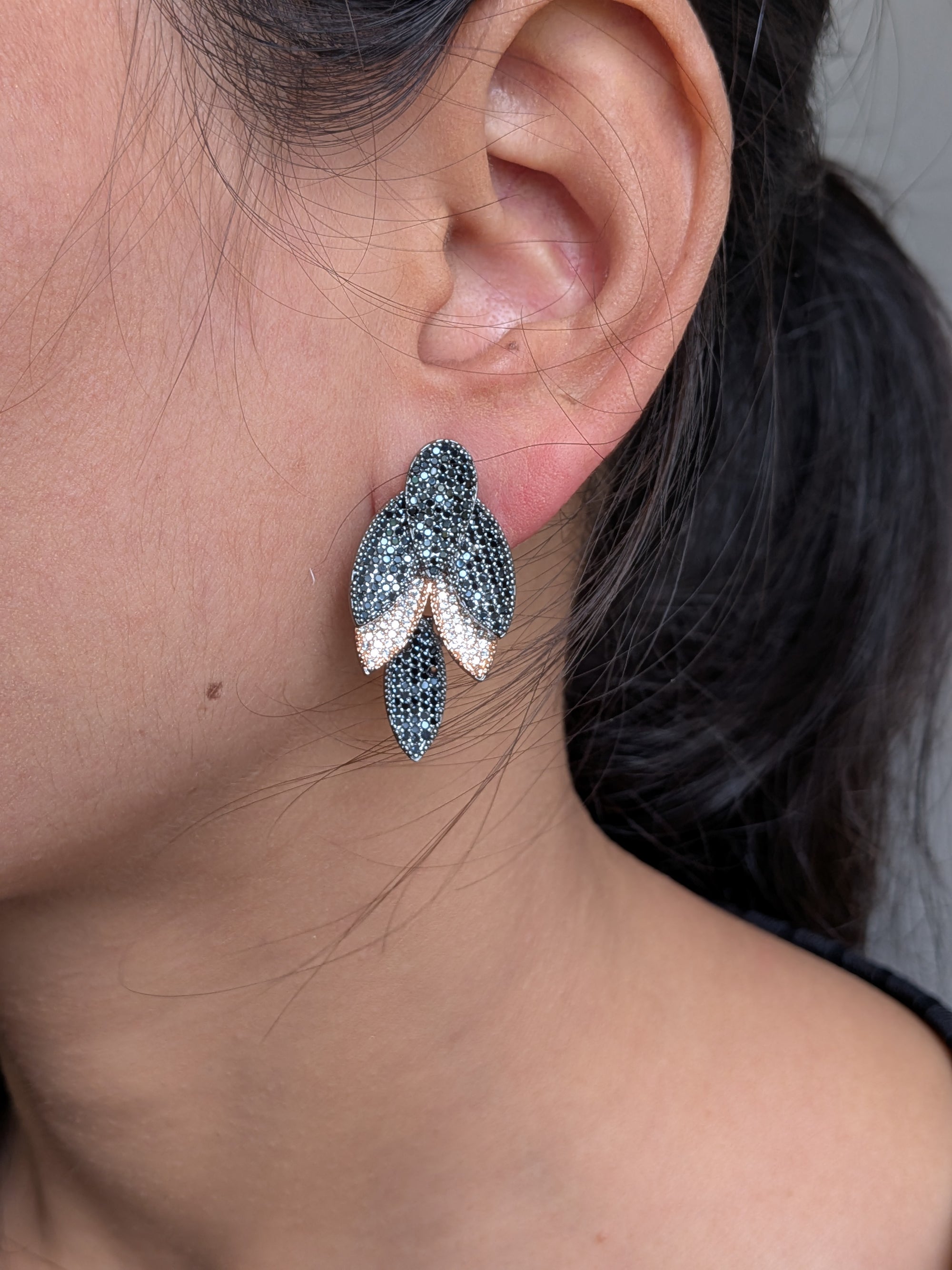 Rosélure Pavé Leaf Earrings – cascading leaf earrings with pink and ruby pavé