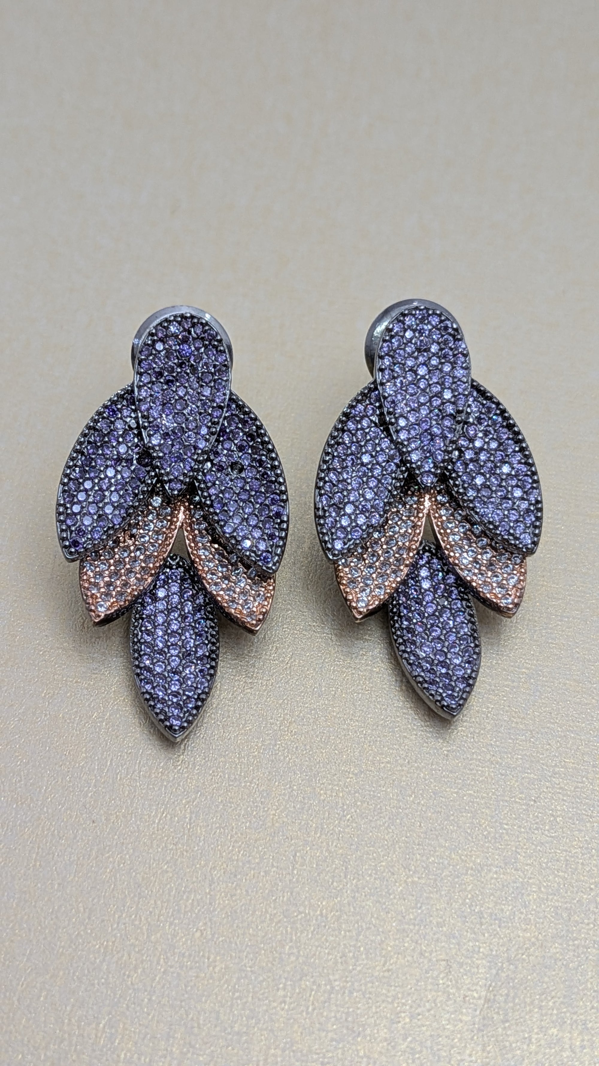 Rosélure Pavé Leaf Earrings – cascading leaf earrings with pink and ruby pavé