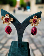 BloomBerry Drop Earrings – gold floral earrings with rich berry-tone matte drops