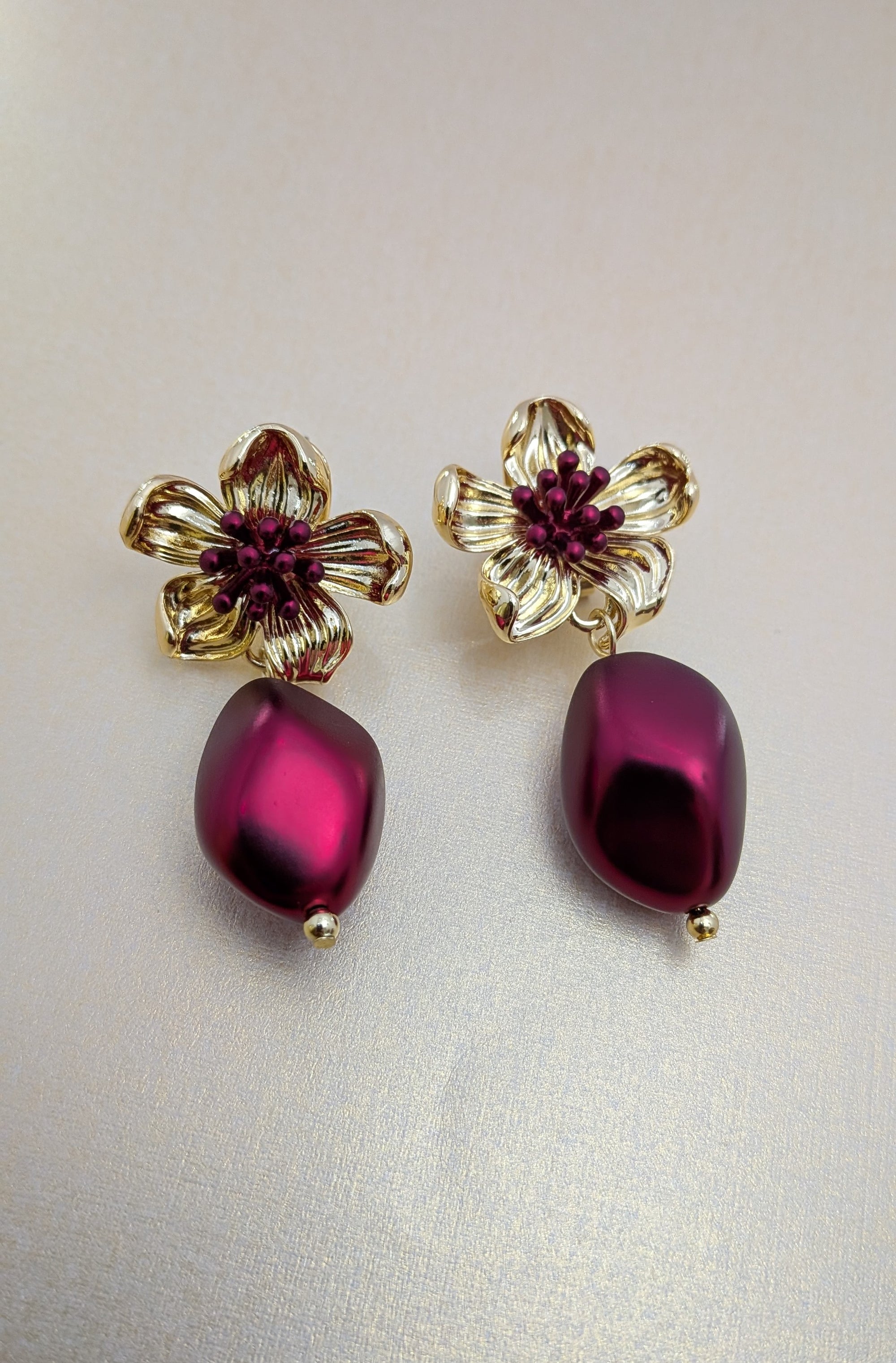 BloomBerry Drop Earrings – gold floral earrings with rich berry-tone matte drops
