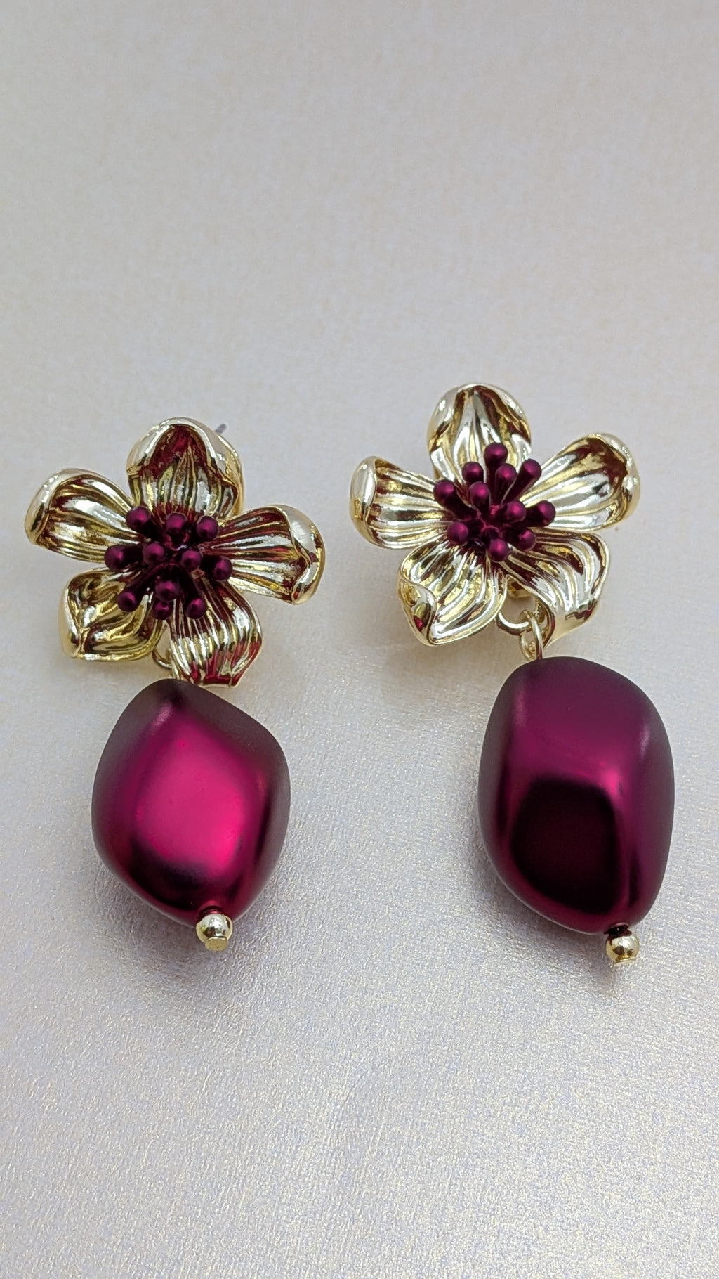 BloomBerry Drop Earrings – gold floral earrings with rich berry-tone matte drops