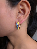 Garden Enamel Hoop Earrings – floral hand-painted earrings on glossy gold hoops