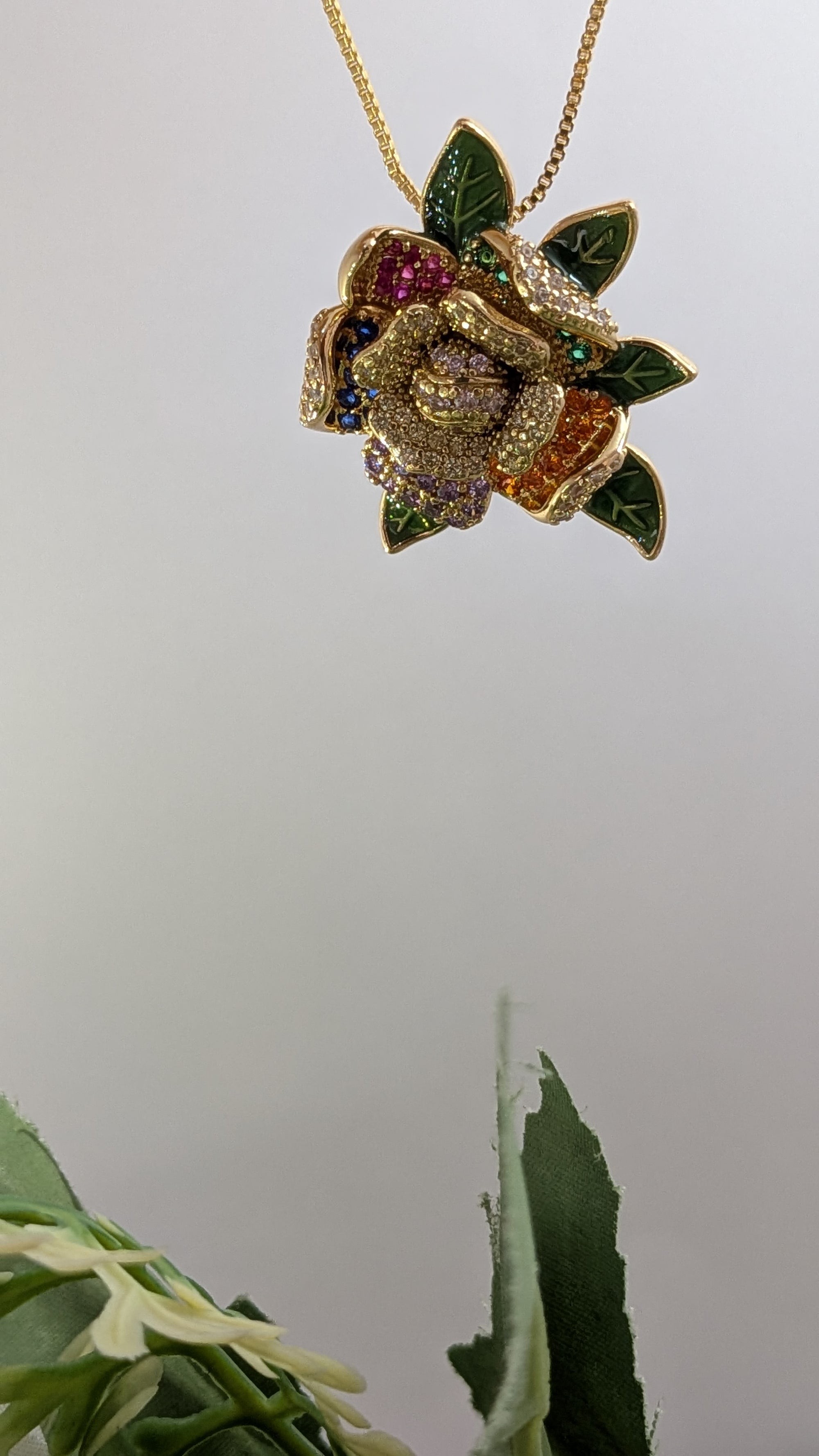 Garden Gleam Pendant Set – enameled leaves and cubic zirconia on gold pendant