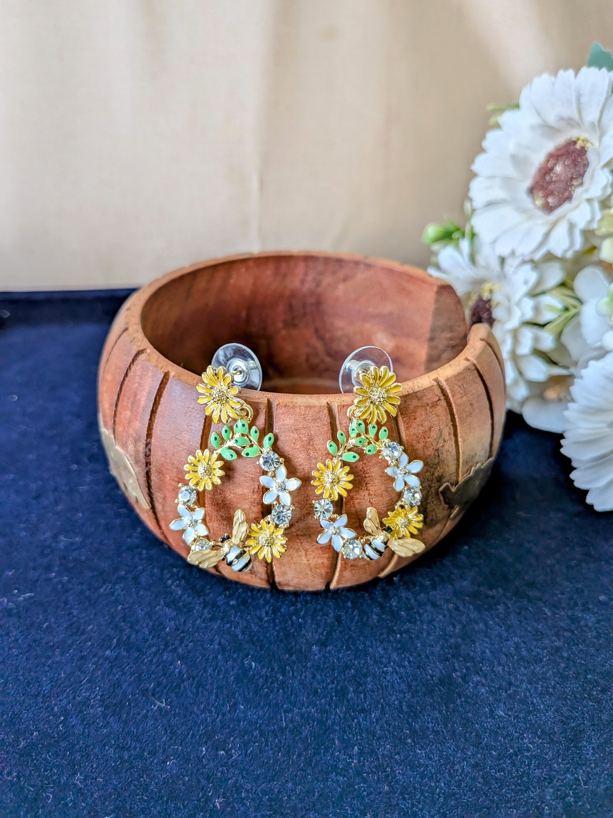 Blossom Buzz Earrings – hoop earrings with yellow daisies, white flowers and bee motifs