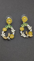 Blossom Buzz Earrings – hoop earrings with yellow daisies, white flowers and bee motifs