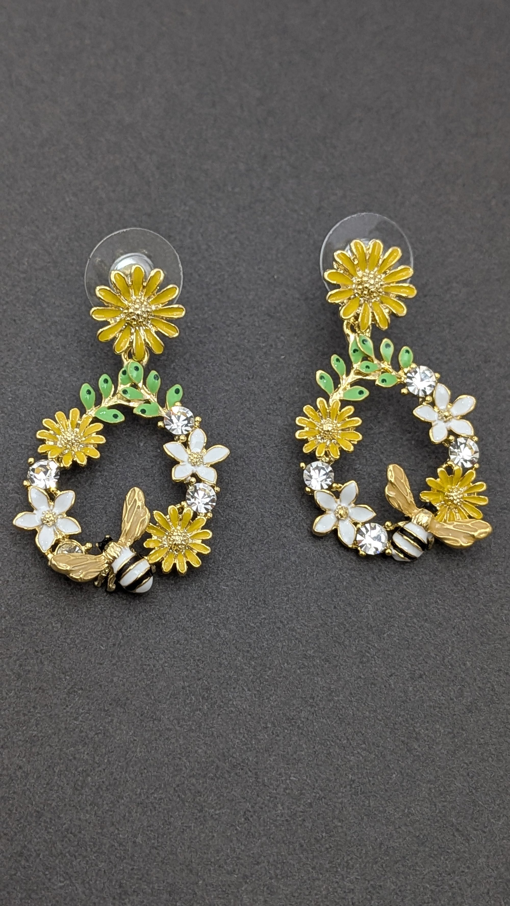 Blossom Buzz Earrings – hoop earrings with yellow daisies, white flowers and bee motifs