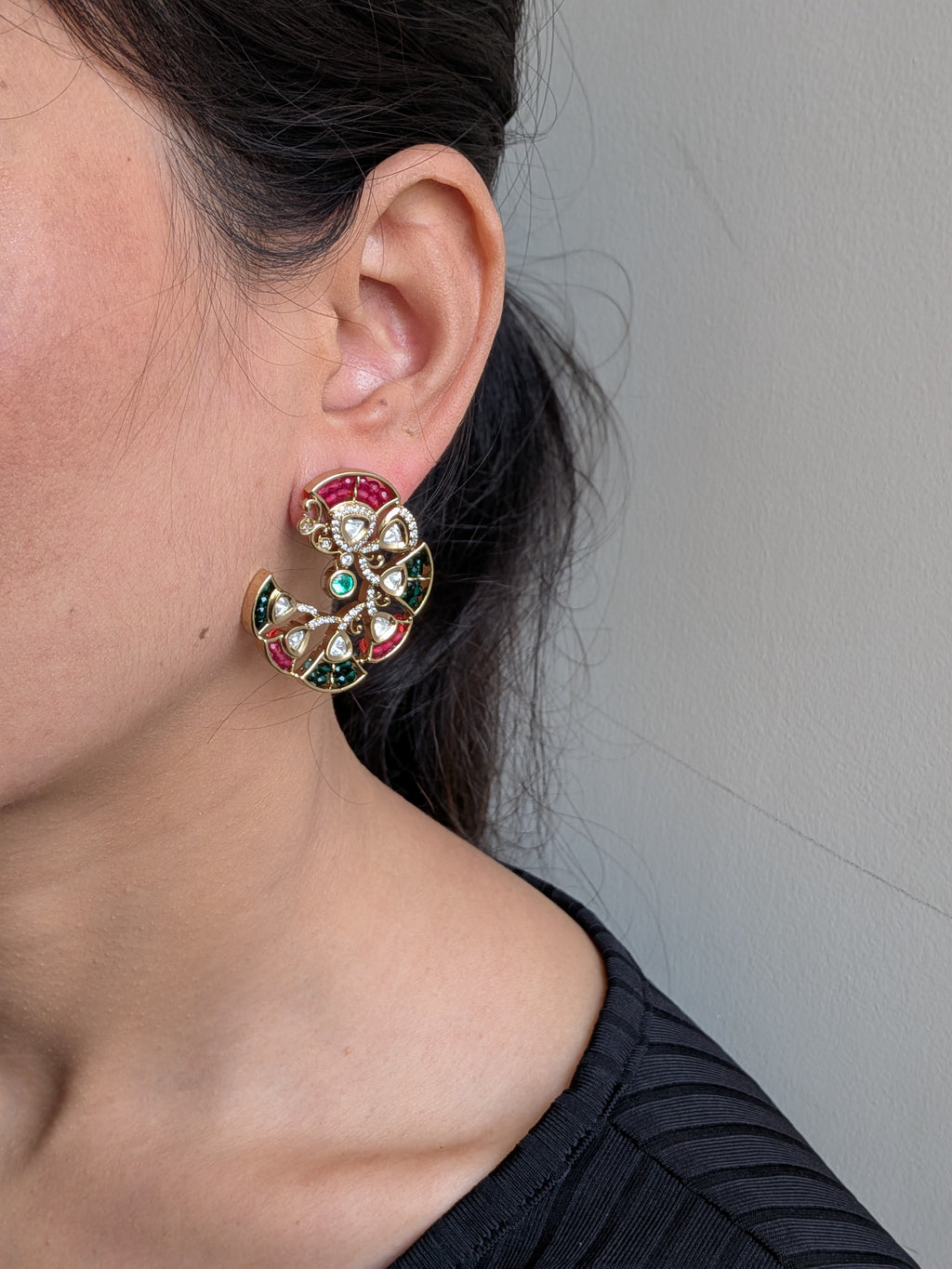 Meher Chandbalis – crescent-shaped chandbalis with green, rose pink, white stones and emerald detail