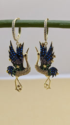 Celestia Flight Earrings – bird-shaped earrings in sapphire, emerald and crystal stones with zircon hoop