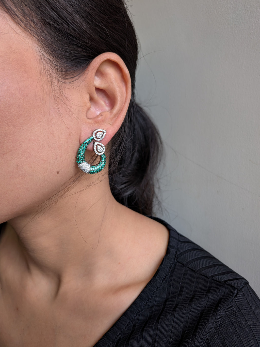 Emerald Grace Studs – emerald-toned teardrop with pavé crystals and pear-shaped tops