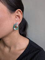 Emerald Grace Studs – emerald-toned teardrop with pavé crystals and pear-shaped tops