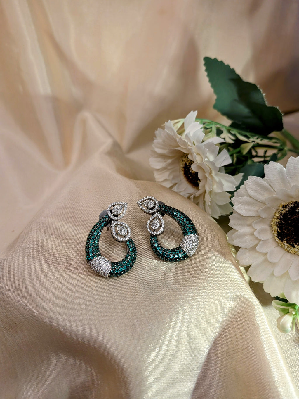 Emerald Grace Studs – emerald-toned teardrop with pavé crystals and pear-shaped tops