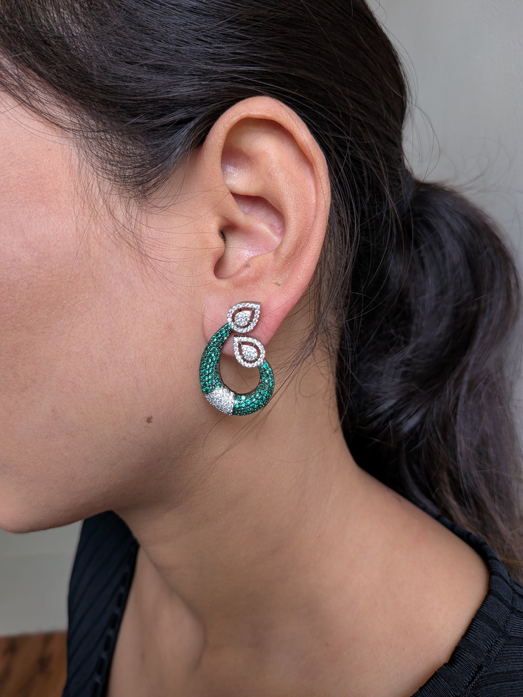 Emerald Grace Studs – emerald-toned teardrop with pavé crystals and pear-shaped tops