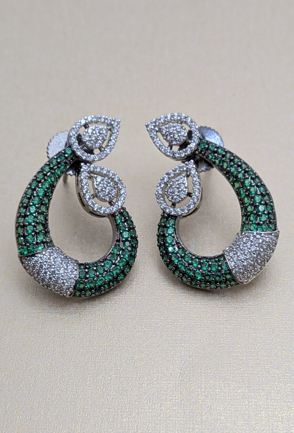 Emerald Grace Studs – emerald-toned teardrop with pavé crystals and pear-shaped tops