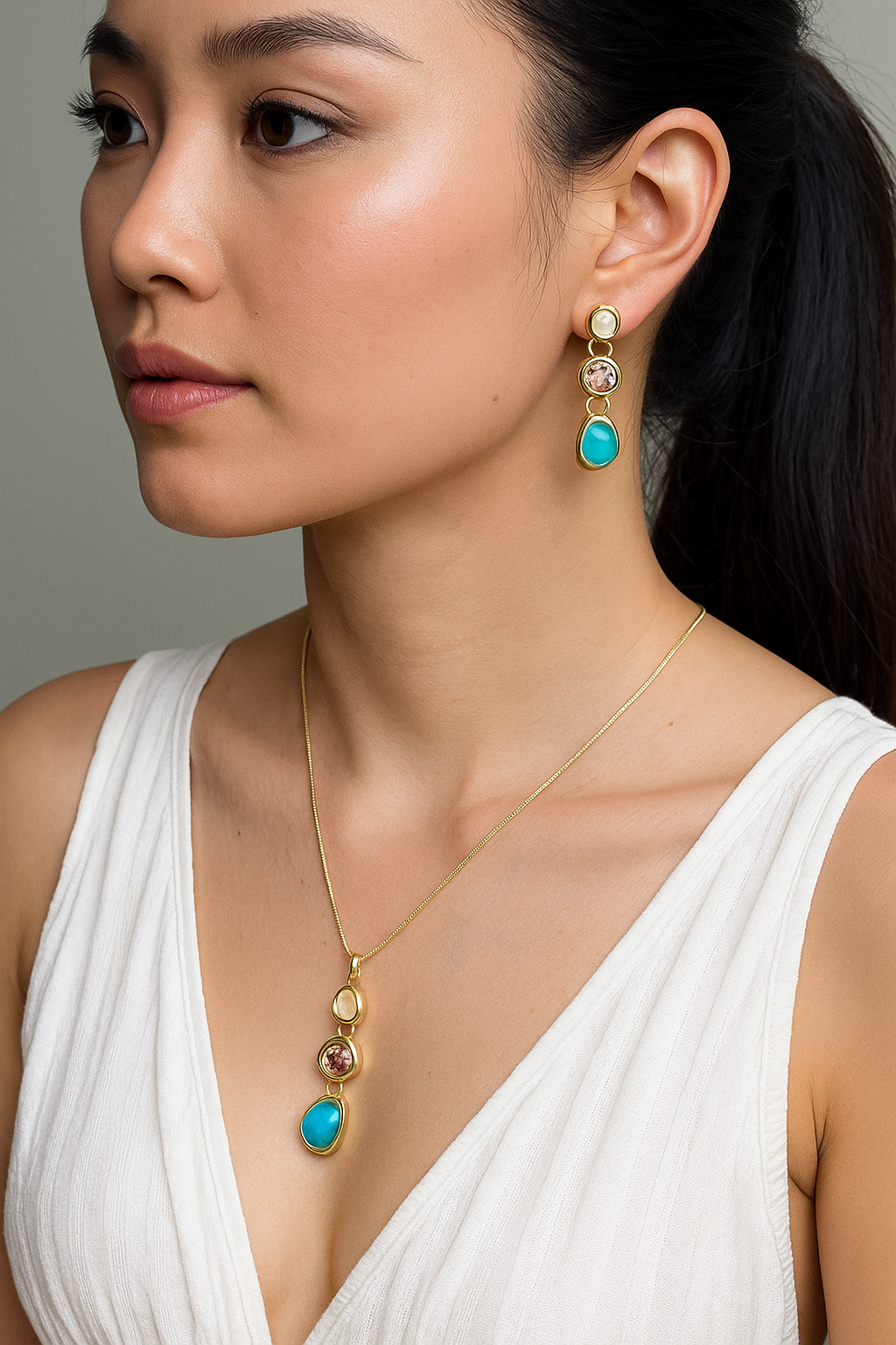 Ocean Glow Pendant Set – cascading pearl, peach, and sea-green stones in gold