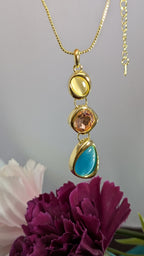 Ocean Glow Pendant Set – cascading pearl, peach, and sea-green stones in gold