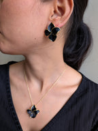 Midnight Bloom Pendant Set – black enamel floral design with gold outline