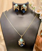 Ocean Whisper Pendant Set – blue, white and sapphire stones in gold frames