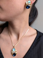 Ocean Whisper Pendant Set – blue, white and sapphire stones in gold frames