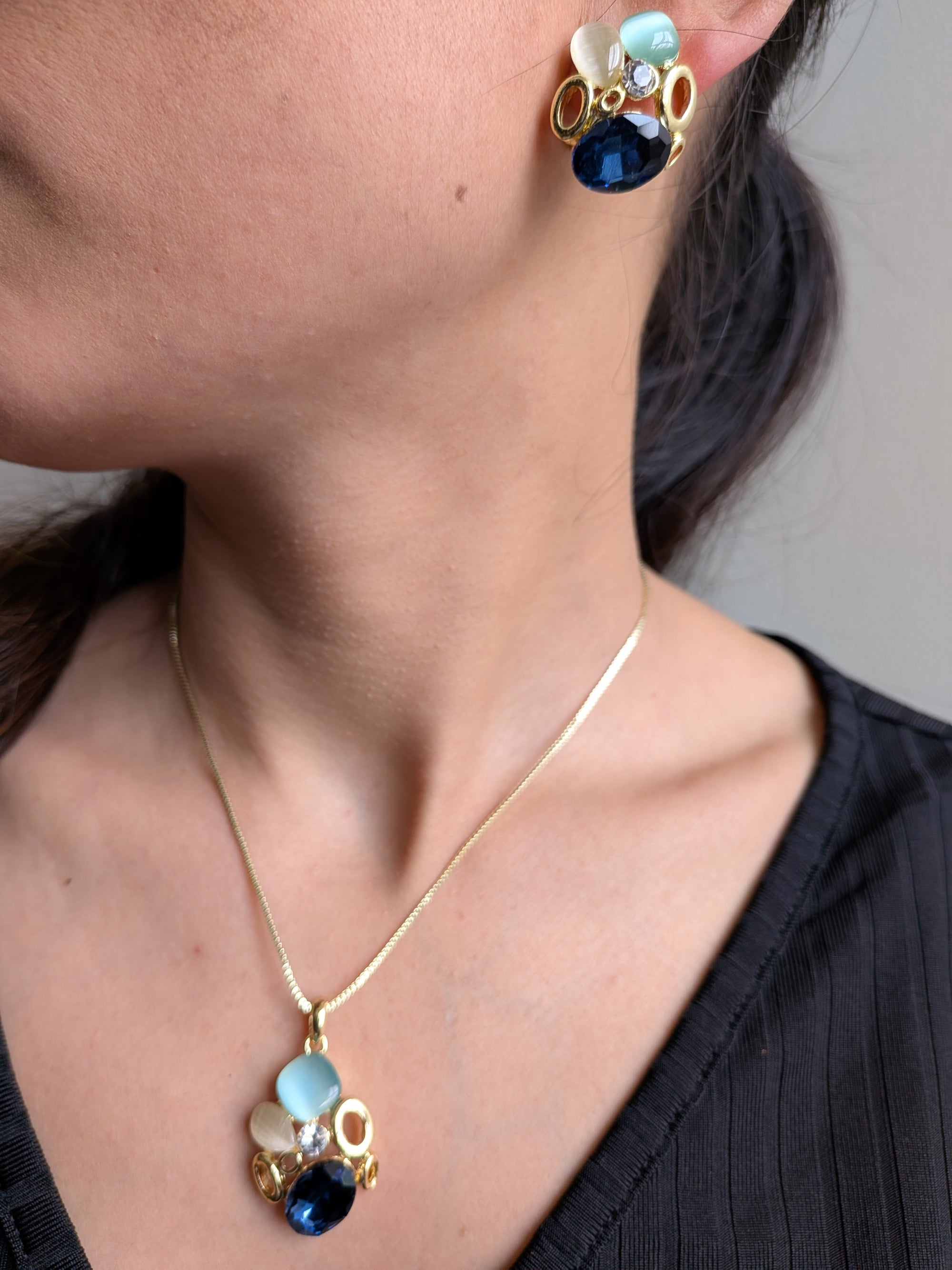 Ocean Whisper Pendant Set – blue, white and sapphire stones in gold frames