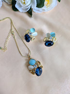 Ocean Whisper Pendant Set – blue, white and sapphire stones in gold frames