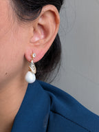 Royal Gleam Pearl Drops – crystal stud earrings with chevron zirconia and glossy teardrop pearls